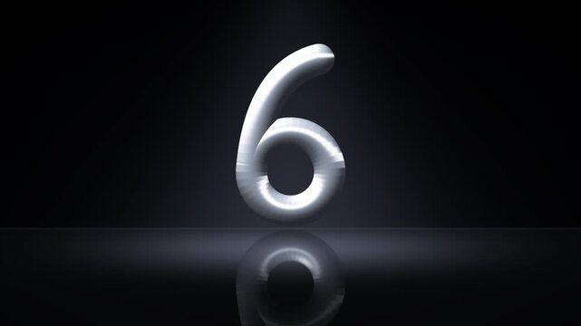Chrome 3D countdown numbers from 10 to 0 drop onto a reflective stage under a spotlight beam on a dark background