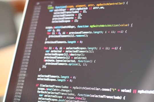 Computer programming code displayed on laptop screen