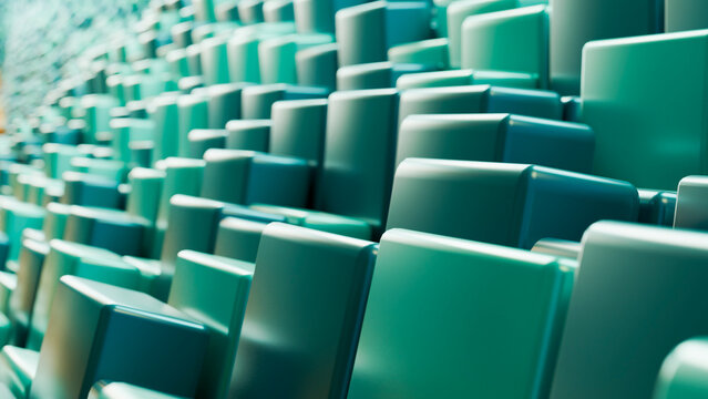 Empty green stadium seats arranged in rows at a large venue