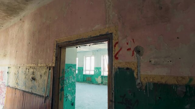 A run-down building with an open door, perfect for scenes of investigation, mystery, or renovation