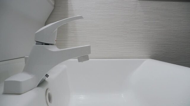 Water continues dripping from faucet after washing hands