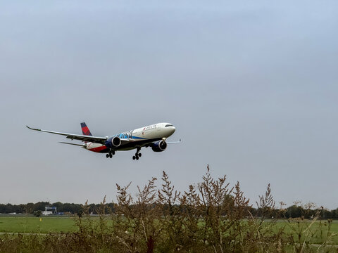 delta airlines airplane landing at Schiphol Airport. Amsterdam, The Netherlands.