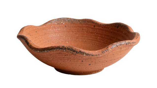 Rustic terracotta wavy bowl with dark rim, isolated on transparent background