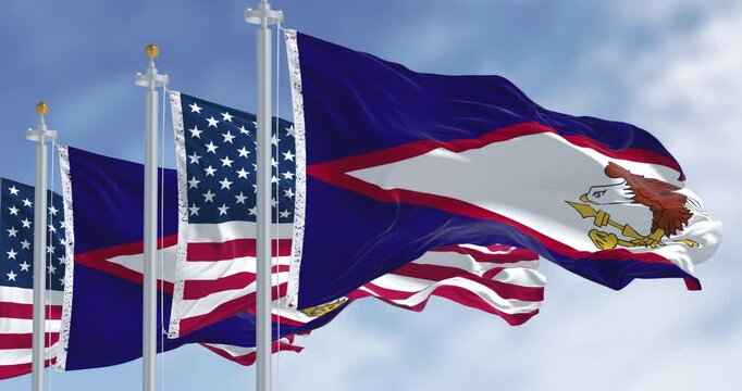 The American Samoa flag waving in the wind on a clear day