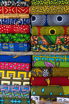 Stacks of colorful wax print fabrics, Lome, Togo