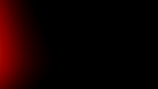 Red light leak effect glowing on black background for cinematic overlay texture, vintage film exposure and abstract lighting design backdrop