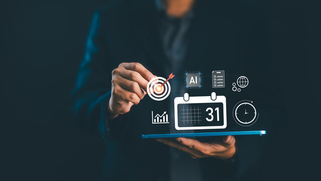Professional businessman holding digital tablet with futuristic AI technology, calendar scheduling, business target, and marketing data analytics icons. Corporate planning and business strategy