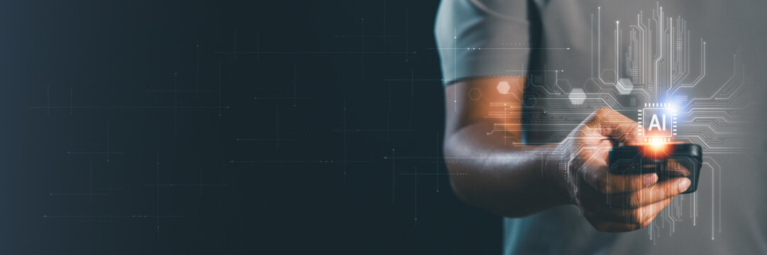 A businessman using a smartphone to interact AI circuit board. Artificial intelligence, digital, innovation, future tech and data management. Technology background banner and copy space