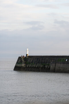lighthouse on the coast of the sea in porthcawl