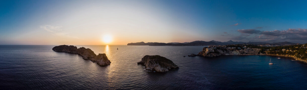 Spain, Mallorca, Region Calvia, Aerial view of Isla Malgrats and Santa Ponca at sunset