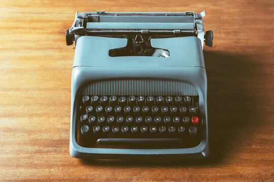 Old typewriter on wood
