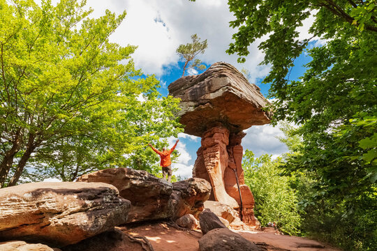 A man exercises at the Devils Table in the Palatinate Forest