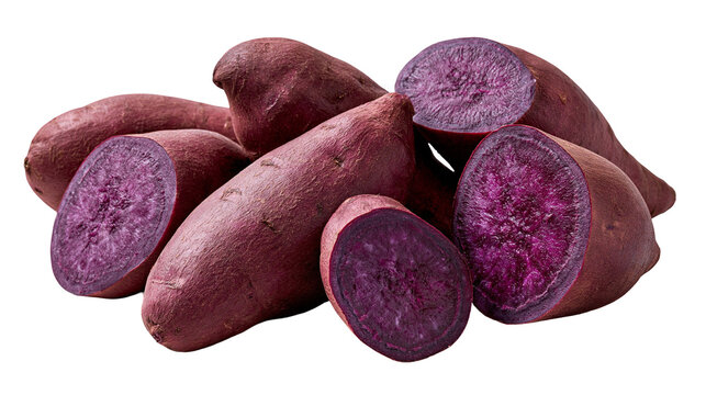 Fresh whole and sliced purple sweet potatoes with vibrant violet flesh
