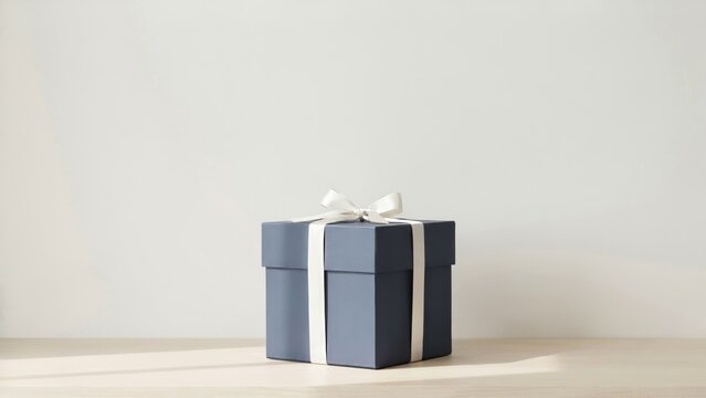 Elegant 3D gift box with golden ribbon and confetti on white background, perfect for birthday celebrations and premium holiday designs