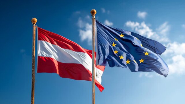 Austrian flag and European Union flag wave together under a clear sky in the city square during the summer season