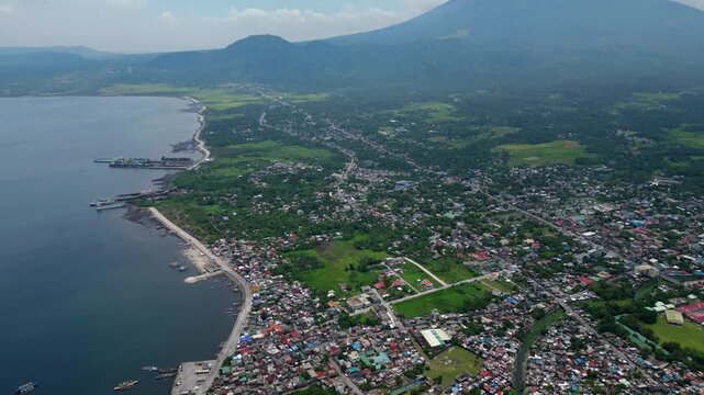 High Altitude Aerial View of San Roque and Fatima, Tabaco City with Mayon Volcano, Philippines