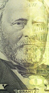 Fine Engraving and Changing Color on Grant Bill Portrait. Ulysses S. Grant portrait fills fifty dollar bill detail as shifting color crosses fine engraved lines.  
