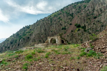 Abandoned Uzbek uranium mine entrance near Yangiabad in evening © MotionStockVideo
