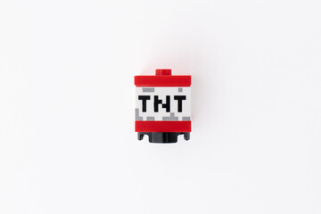 Naklejka premium Lego Minecraft TNT block shot isolated on a white background with room for copy space. Bradford, UK Oct 2 2026
