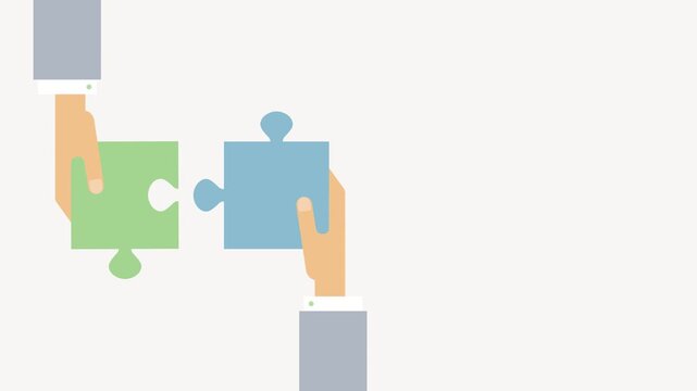 Business hands connecting jigsaw puzzle pieces for success