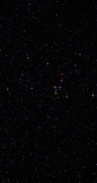 Distant Stars Glow Across Night Sky. Sparse points of light lend dark sky enigmatic, expansive feel.