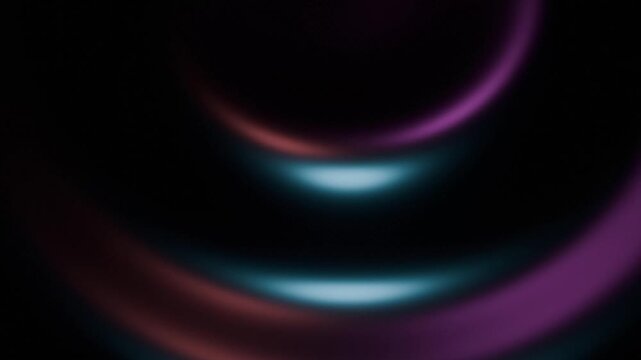 Abstract swirling light gradients moving against dark background forming digital energy vortex motion graphic in 4K footage video for technology concepts