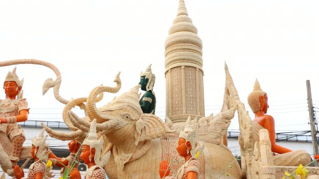 Beautifully carved wax float procession in Ubon Ratchathani Candle Festival, Thailand.