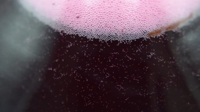 Release of gas bubbles during wine production from grapes.
