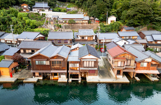 Ine Bay, Kyoto, Japan at the Funaya boat houses at dusk 706