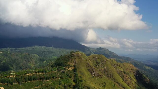 Aerial View of Green Mountain Ridges Under Heavy White Clouds in Sri L