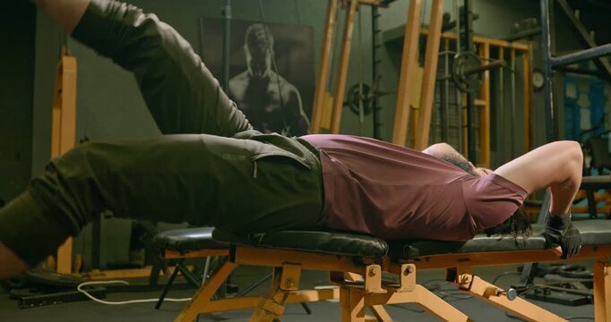 Professional Core Workout With Abdominal Exercises in Gym &mdash; Athlete performs an intense abs training session designed to strengthen and define the abdominal muscles. Cinematic fitness footage captures