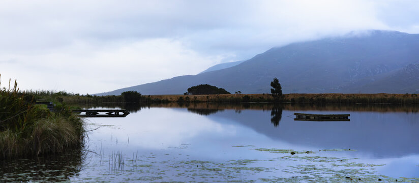 beautiful placid pond under muted overcast skies, Stanford, South Africa
