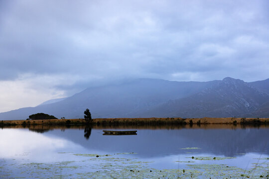 beautiful placid pond under muted overcast skies, Stanford, South Africa