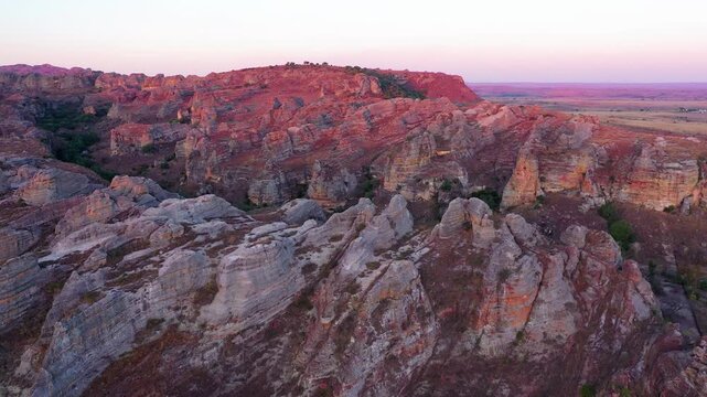 Rugged Isalo rock massif in warm twilight aerial view