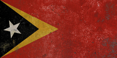 East Timor national flag painted on textured wall mural background © Cristian Valderas