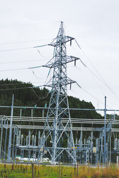 Large electrical substation in Norway with high voltage transmission lines, pylons and grid infrastructure