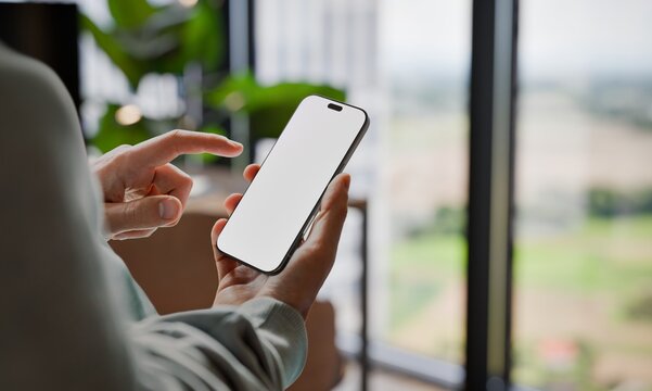Smartphone Blank Screen Mockup in Modern Office, Close-Up Side View