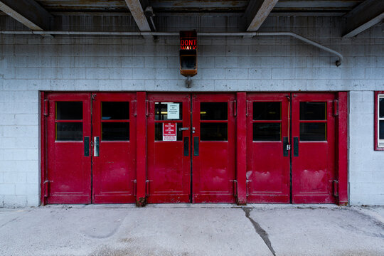 Martins Ferry, Ohio - Red Doors and Warning Light on Concrete Block Wall at Former Steel Mill