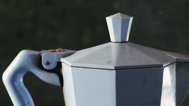 Italian metallic coffee geyser maker. Mocha coffee pot for making espresso coffee