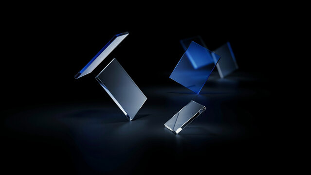Floating blue and clear glass rectangles arranged in a dark space with sharp light reflections