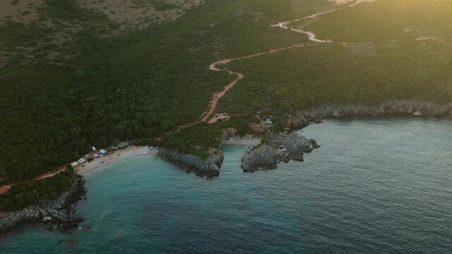 Rocky Coastal Cove with Dirt Access Road in Himare Albania