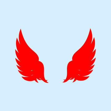 Pair of red wings illustration isolated on light blue background. Ideal graphic design element for heraldry, freedom, speed, mascot, and sports club logos.