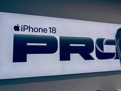 Bratislava, Slovakia - October 2, 2026: Illuminated advertising sign of Apple iPhone 18 Pro with Apple logo in an electronics store.