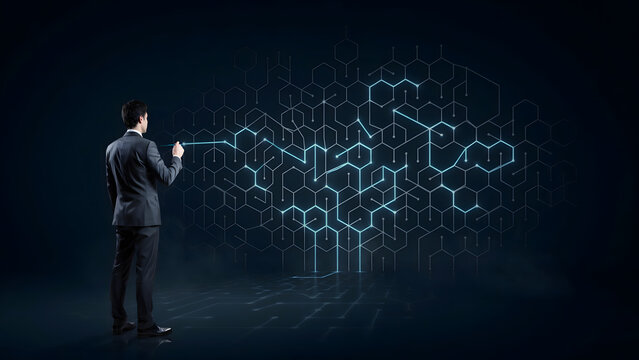 Businessman interacting with glowing digital network interface while standing in dark futuristic environment with blue lights