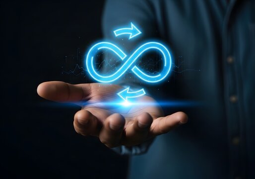 Person holding glowing blue infinity sign with rotating arrows symbolizing continuous process