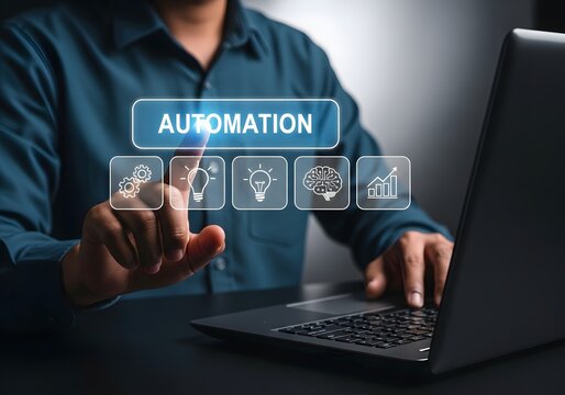 Businessman pointing at automation concept virtual screen interface with laptop on desk in office