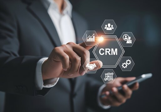 Businessman pointing finger at crm customer relationship management hologram interface screen