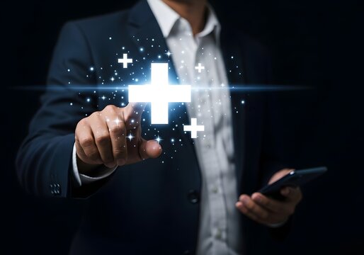 Businessman touching glowing plus sign medical healthcare symbol interface in futuristic concept