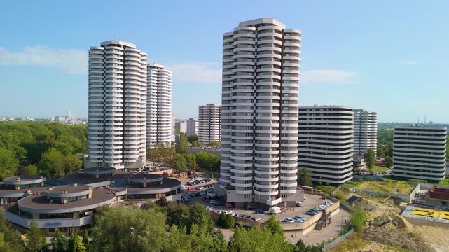 Aerial view of the iconic Kukurydze (Corn) residential towers in Katowice, Poland, featuring distinctive curved balconies resembling giant ears of corn