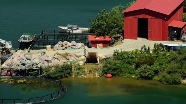 Aerial View of Red Barn and Fish Pens in Vau Dejes Albania